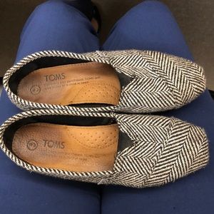 TOMS black and white herringbone slip ons